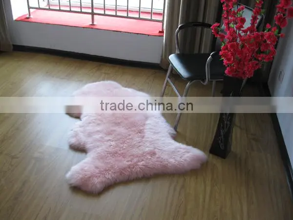 Real new zealand pink sheepskin rug