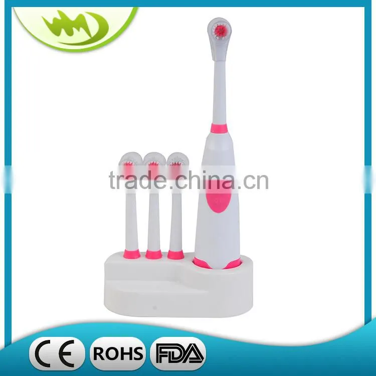 Battery operated adult electric toothbrush with brush head holder
