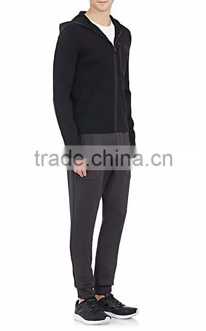 Black rib-knit virgin wool zip-front hoodie styled with tech-fabric elbow patches