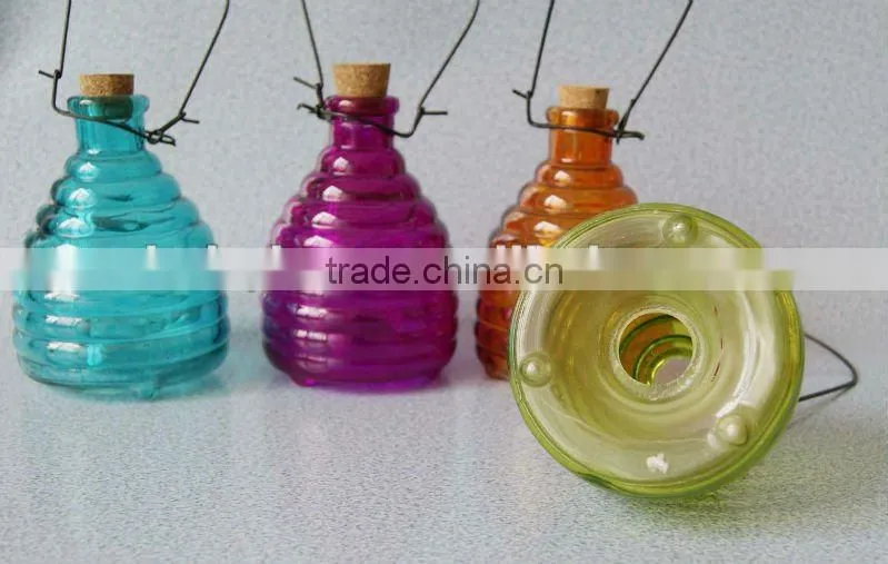 colored glass bee catcher with soft wood lid