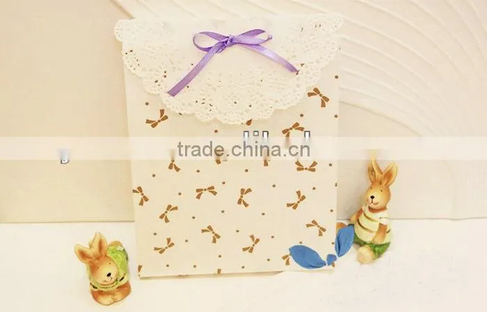 Yiwu custom handle wedding decorative paper bags