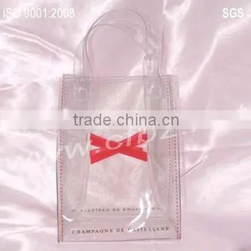 Pink plastic gift bag with zipper and rope handle