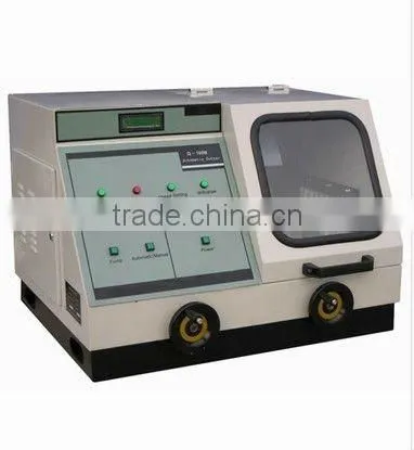 MODEL Q-100B AUTOMATIC CUTTING MACHINE