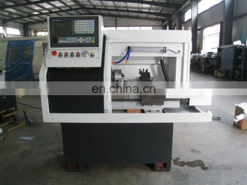 The small cnc lathe machine with chuck and tool turret CK0640A