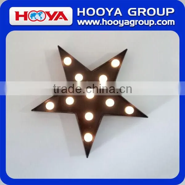 marquee light with five-pointed star shape with different colours