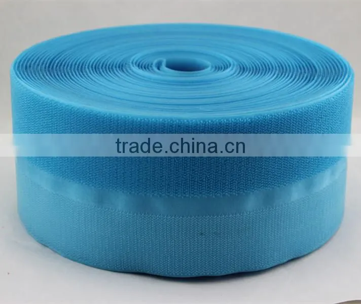 Side by side combined one surface hook and loop fastener tape