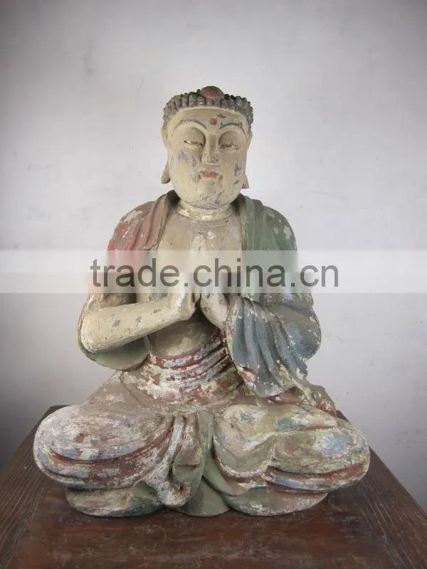 wood sitting buddha statu