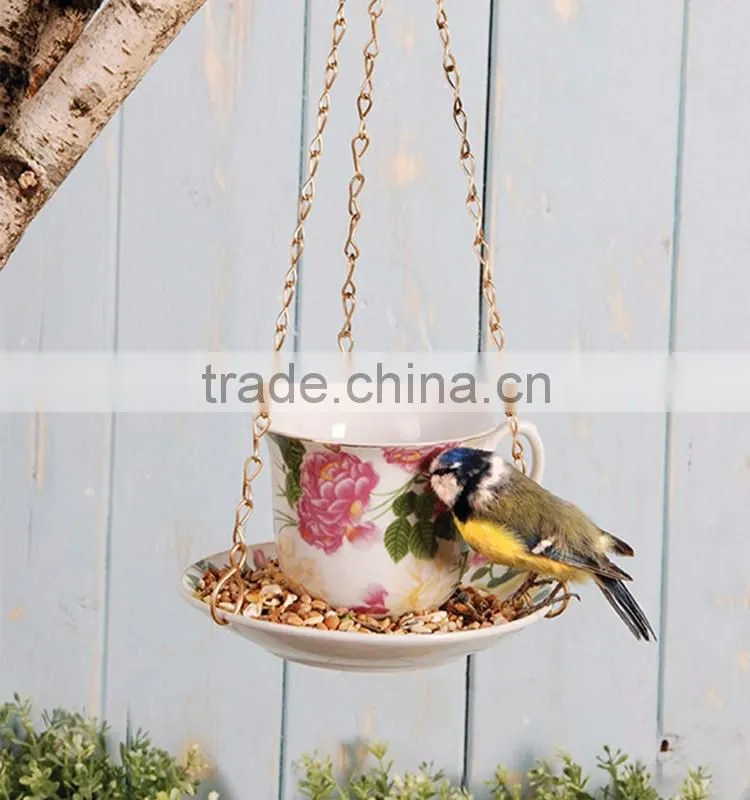 Hanging teacup ceramic bird feeder