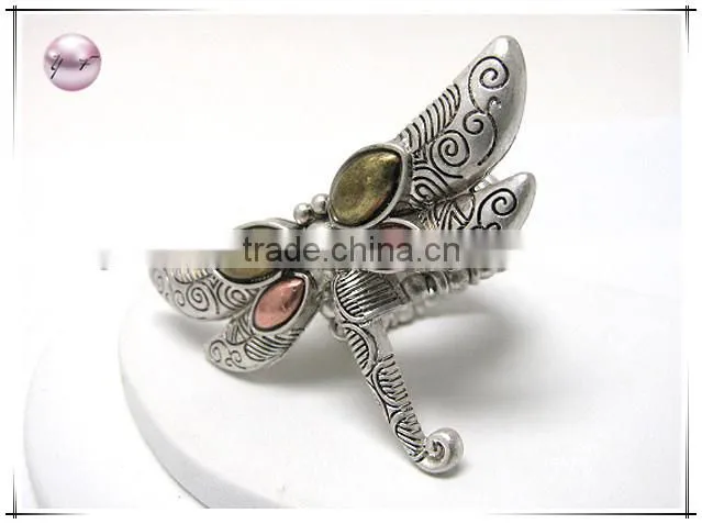 Tri tone textured metal dragonfly stretch ring