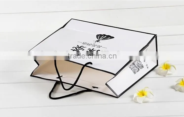 Ivory board paper bag ,shopping bags,promotion bag ,rope handle , customized printing is welcome