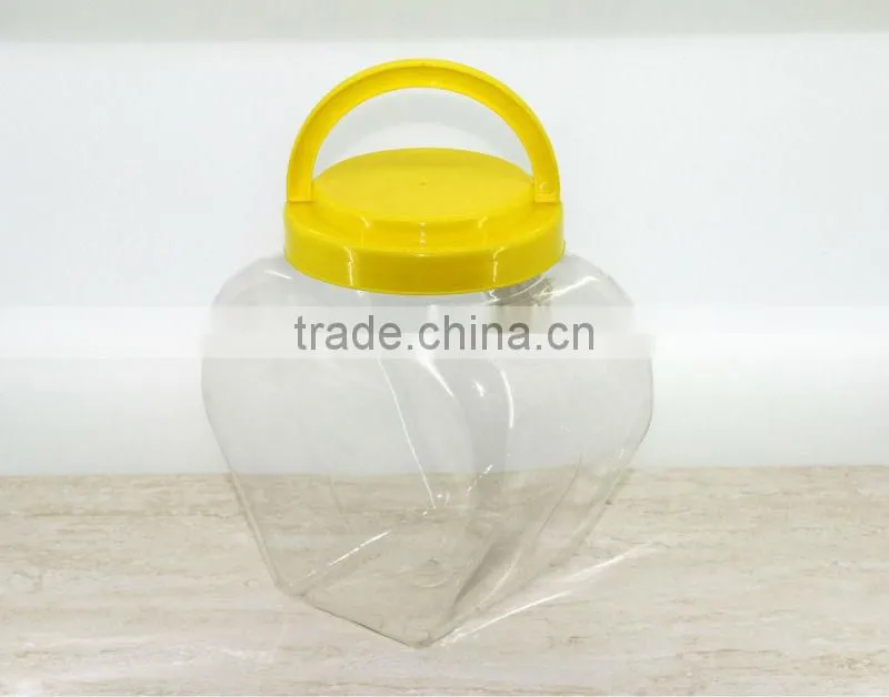 clear candy plastic jar with yellow screw cap