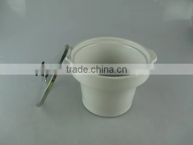 Stocked ceramic tureen with glass lid and iron stand