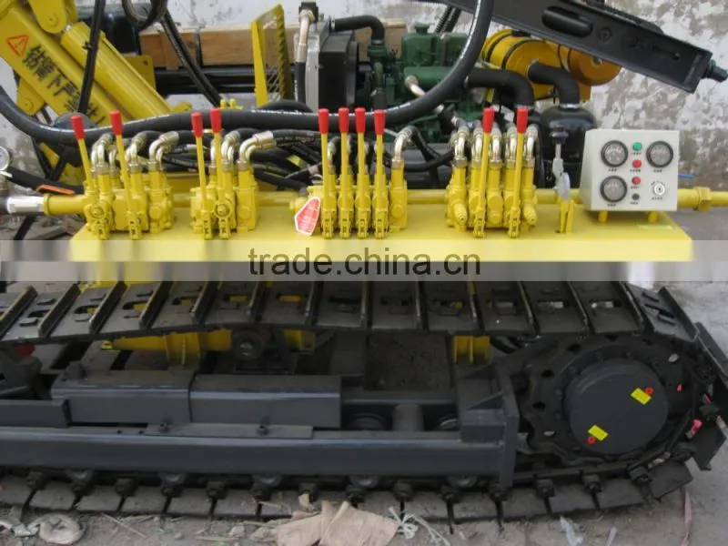 High Performance Low Cost Portable Tracked Drill for Boreholes