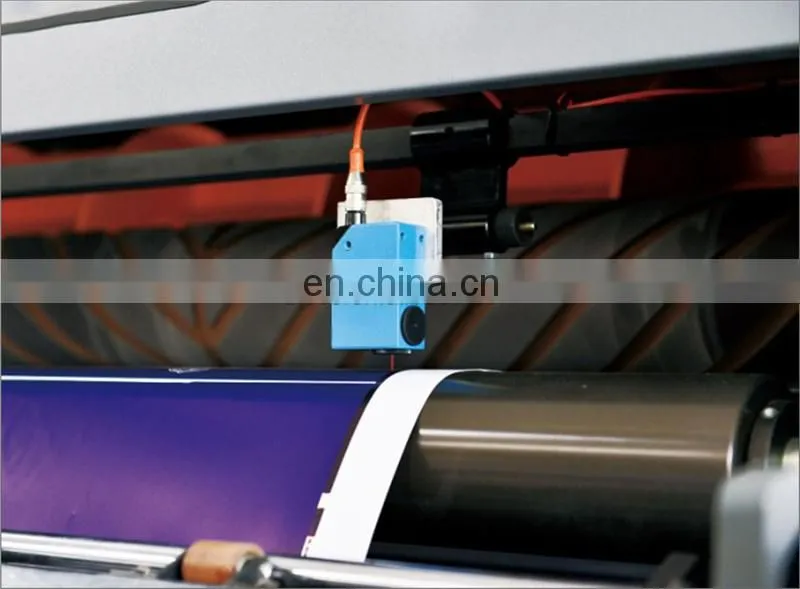 UCM1900A High Speed 4 Roll Automatic Paper cutting slitting Machine with conveyor belt stacker