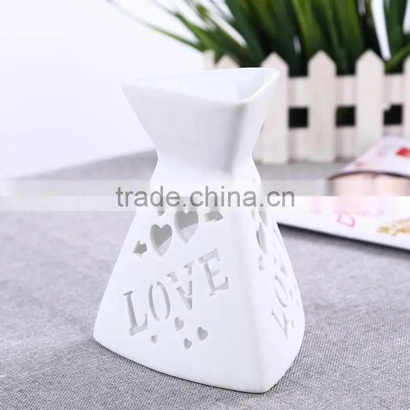 Letter engraved candle holder