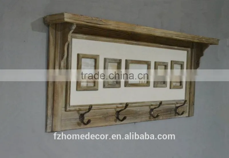 Retro vintage wall shelf with frames and hooks