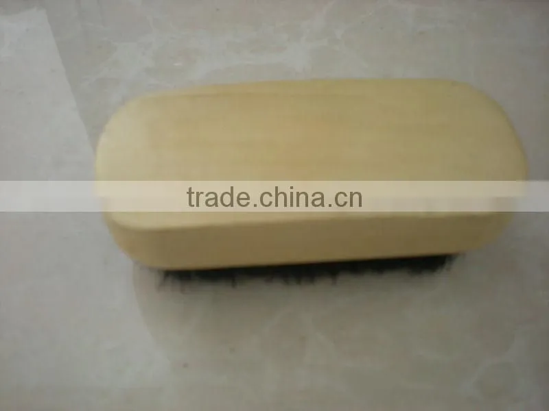 small wooden shoe brush