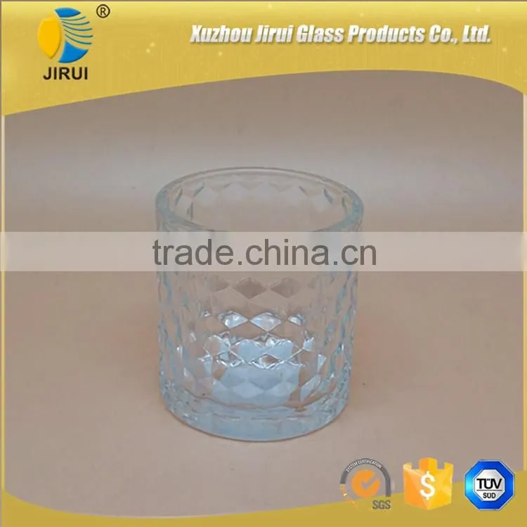 cylinder glass candle holder with engraved design