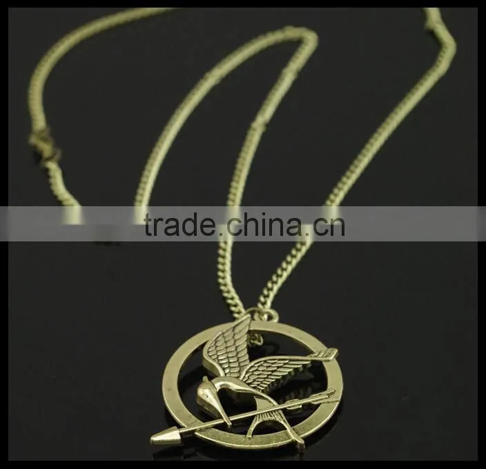 Hunger game gold bird Sweater clips Cardigan clips collar clips Gold sweater guard
