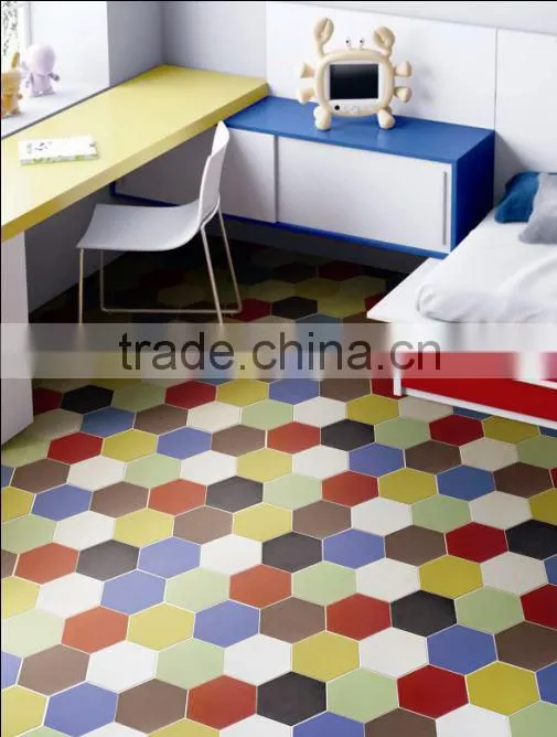 green ceramic tile with flower design