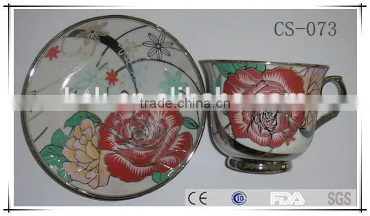 Porcelain , full decal , cup/saucer set