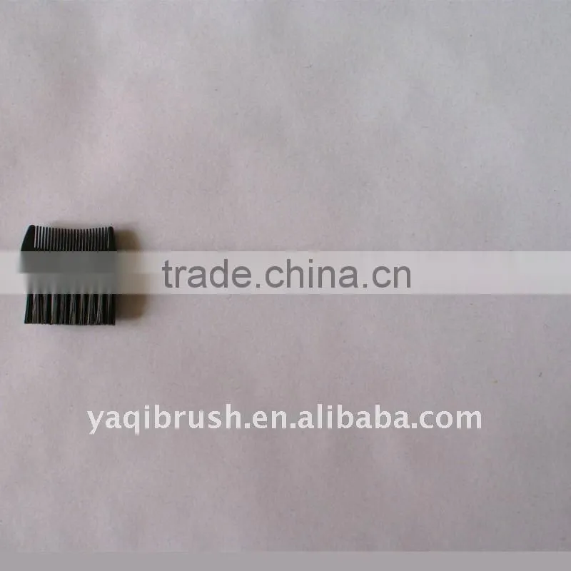 eyebrow comb and lash brush with red handle