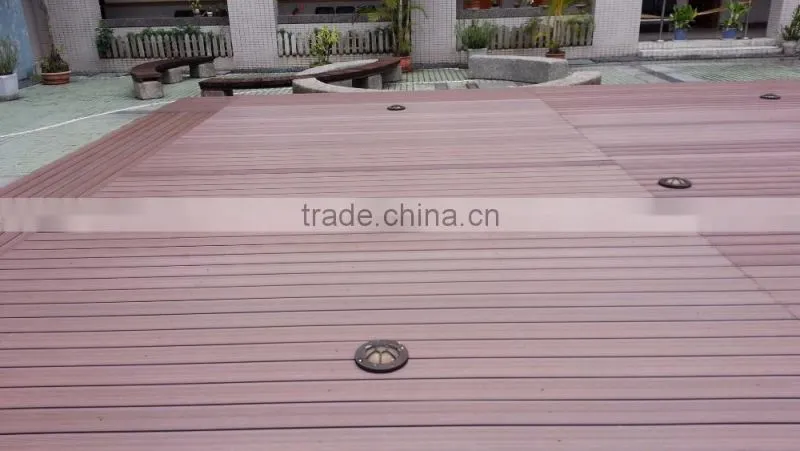 Wood plastic composite outdoor decking flooring with weather resistance features