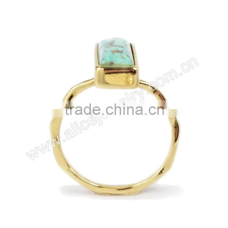 Natural blue turquoise set into a 18k gold bezel