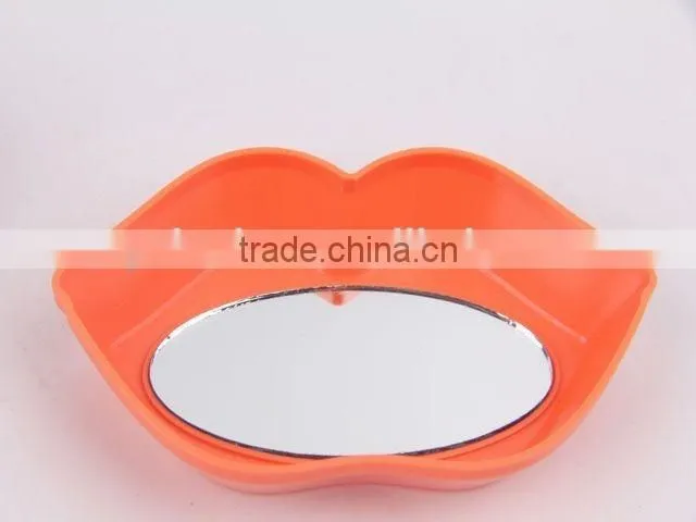 Lip shaped plastic massage comb with mirror/hair brush