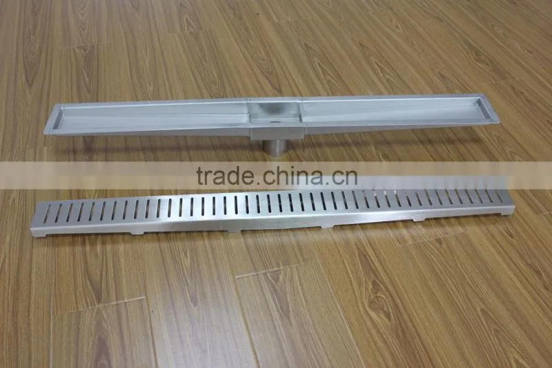 Sloped stainless linear shower drain. floor drain with vertical waste