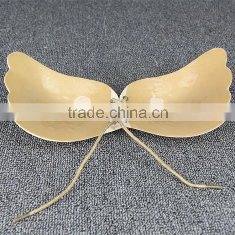 Junyan hot sale nude black invisible cloth silicone bra with string