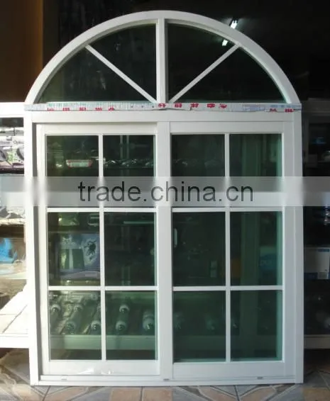 aluminum side hung casement window with half round spoked pediment