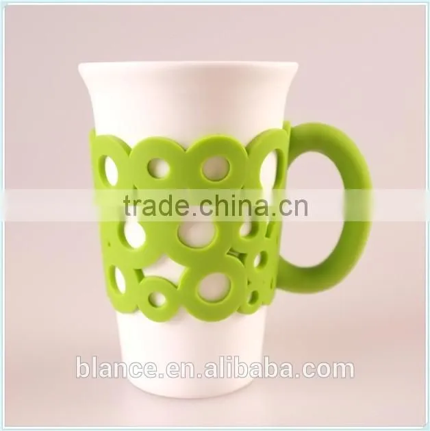 ceramic coffee mug with unique handle in silicone