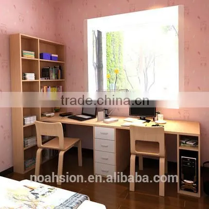 couple desktop laptop work desk with bookshelf
