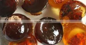 brown sugar flavored sour hard plum candy with sugar coated