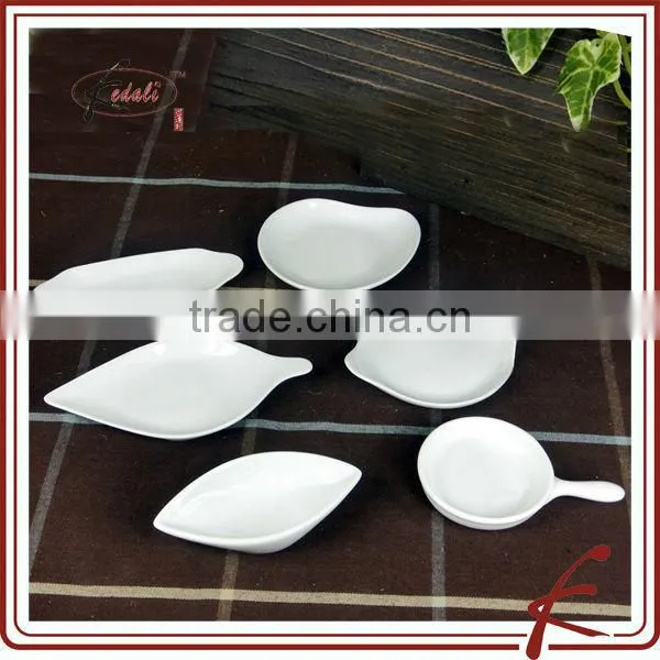 white ceramic heart shaped bowl