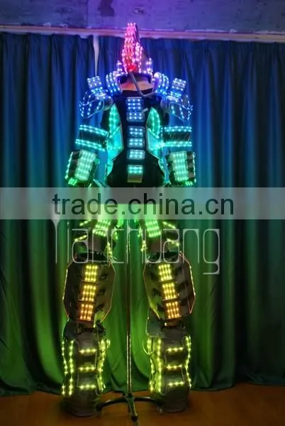 stilt walker performer on jumping stilts with LED costume, LED stilt costume