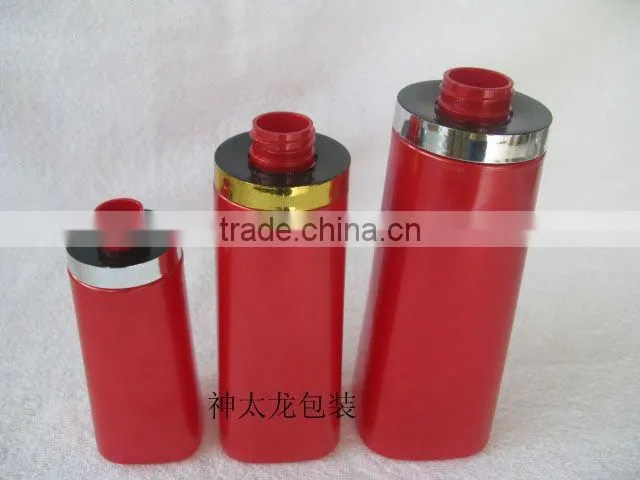 Red Plastic shampoo bottle