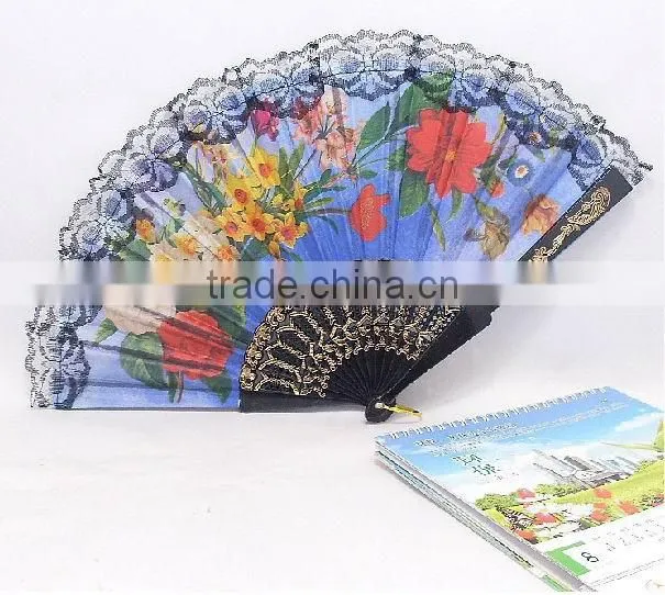 Spanish style plastic folding fan with flower