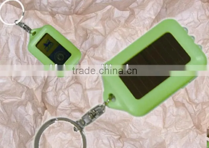 2015 cheap plastic led solar power keychain