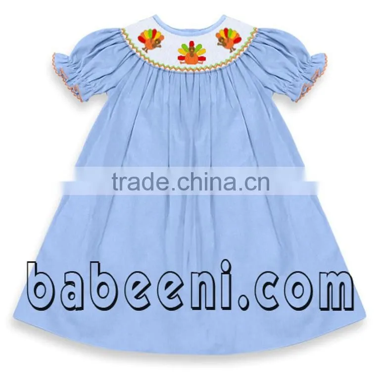 Cute pumpkin truck hand smocked bishop dress
