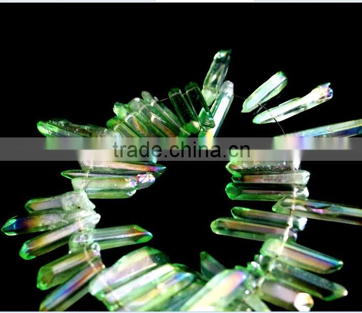 Green aura of titanium coating on quartz crystal necklace for healing