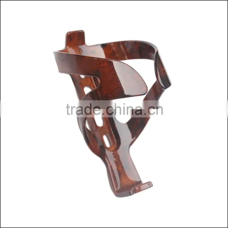 Production Wholesale mountain road bike cycling water bottle cage cup holder peach wood engineering materials PC Bottle Cage