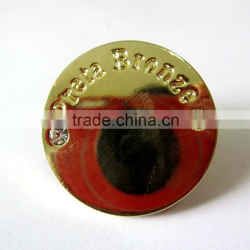 a crystal gold color jeans button