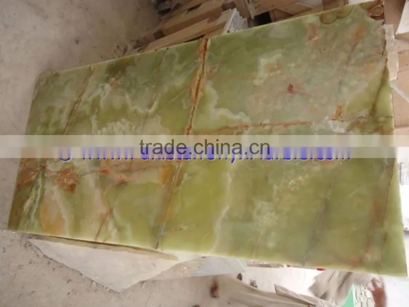 A GRADE DARK GREEN ONYX TABLE TOPS COLLECTION