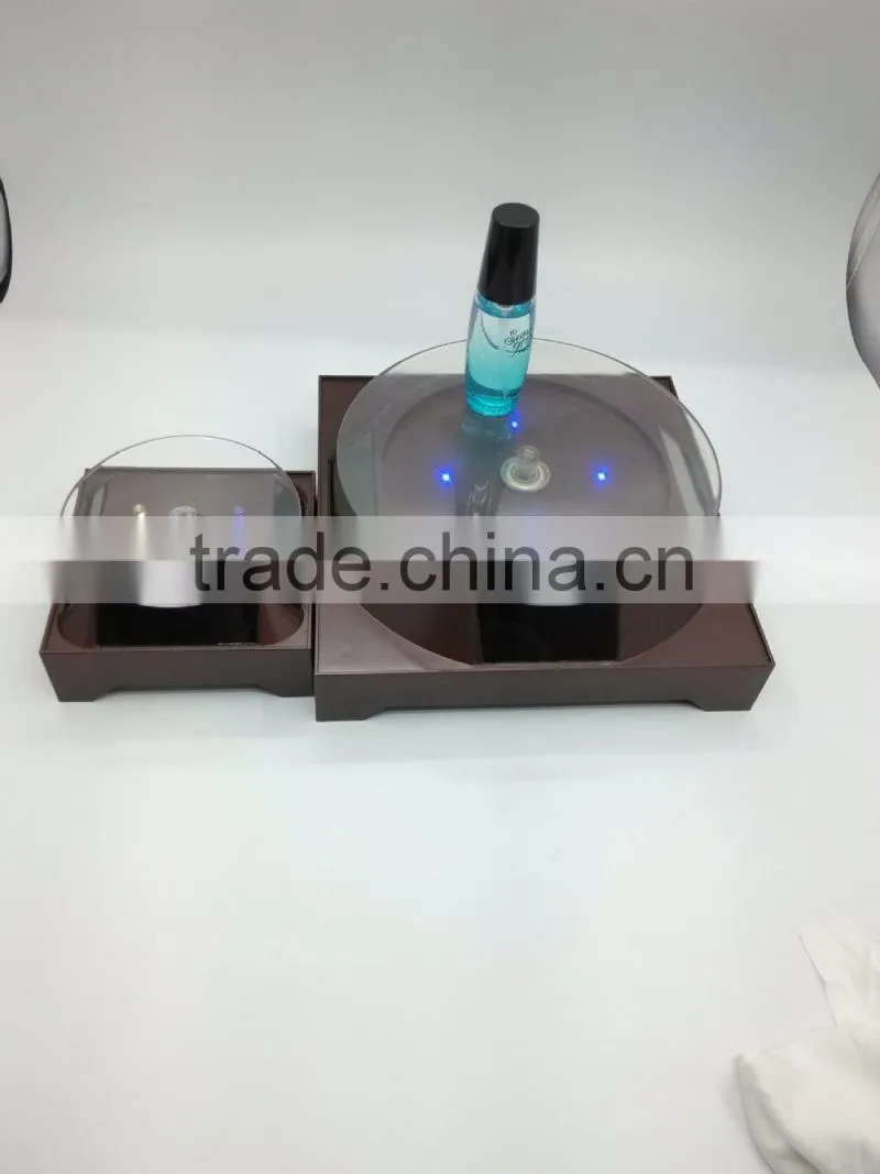 2015 New solar power rotating display stand for iphone 6 plus
