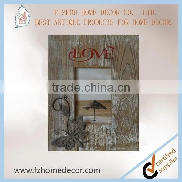 Wooden photo frame with love letter and metal butterfly decor
