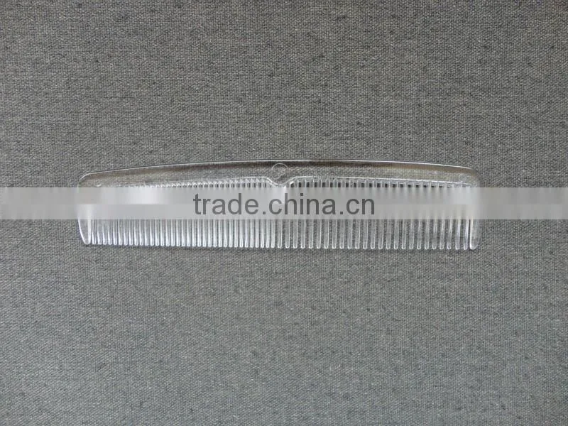 white plastic straight hotel comb