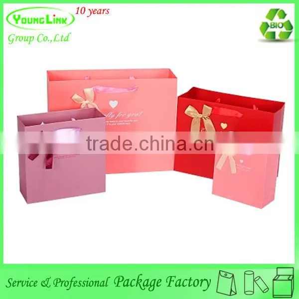Lovely gift carrier paper bag/custom made shopping bags/paper bags with handles