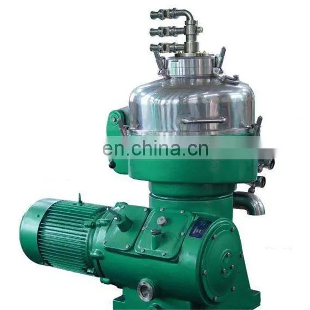 Continuous flow milk fat clarifier